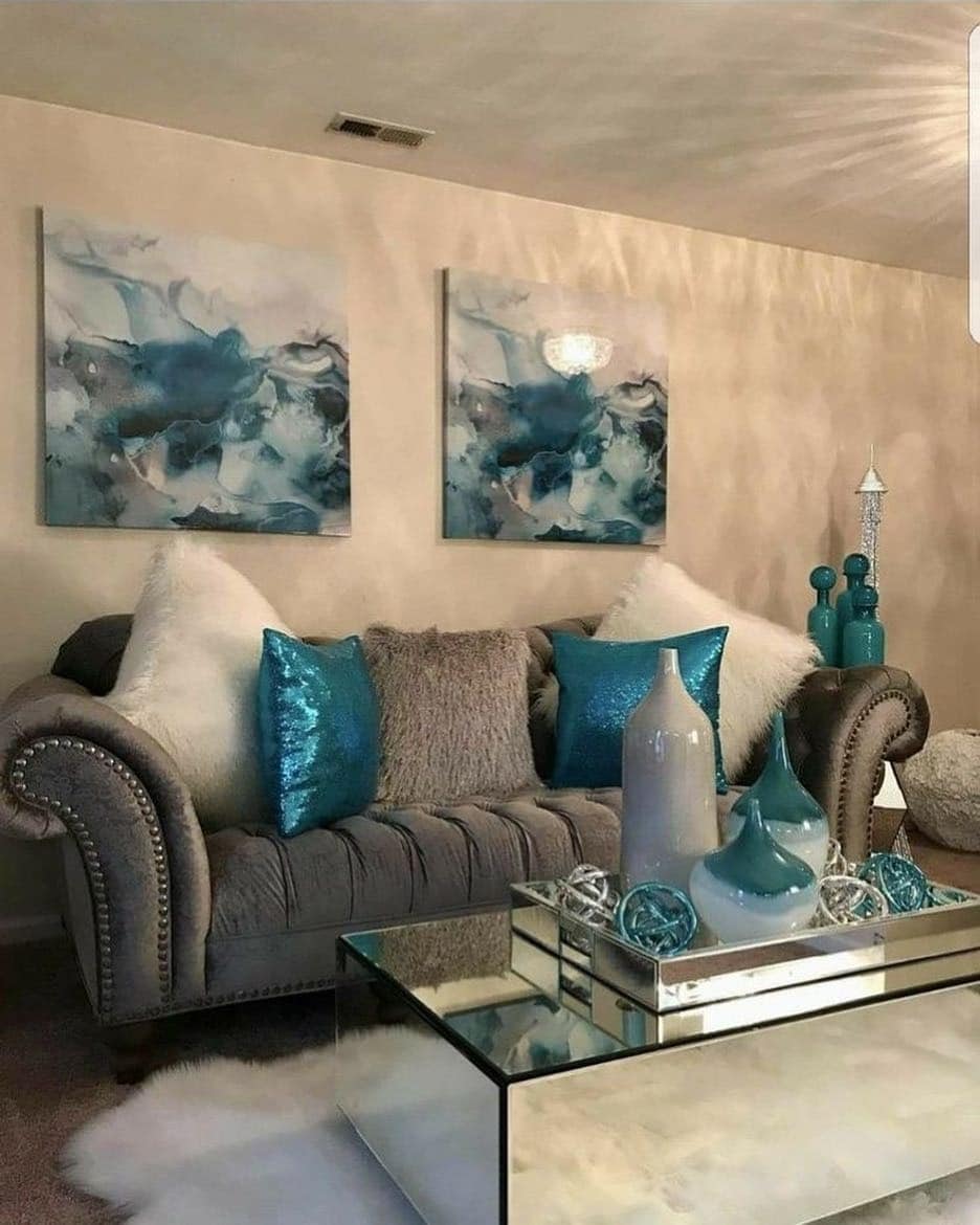 22. Glam Gray Living Room with Teal Decorative Styling - gray and teal living room ideas
