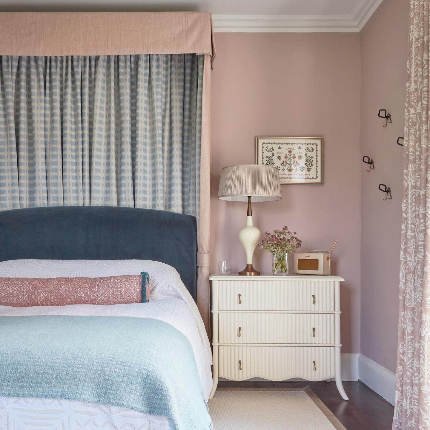 2. Classic Pink with Tailored Elegance - light pink bedroom ideas