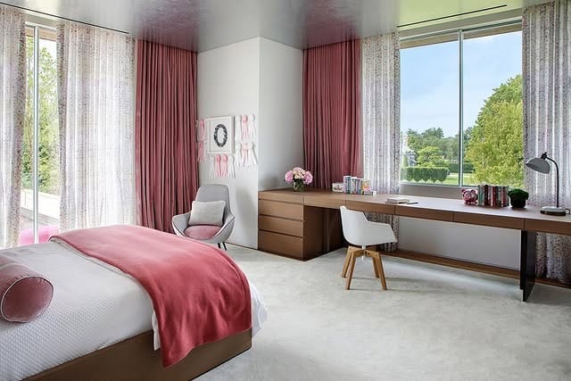 8. Refined Pink Accents in a Spacious Layout - light pink bedroom ideas