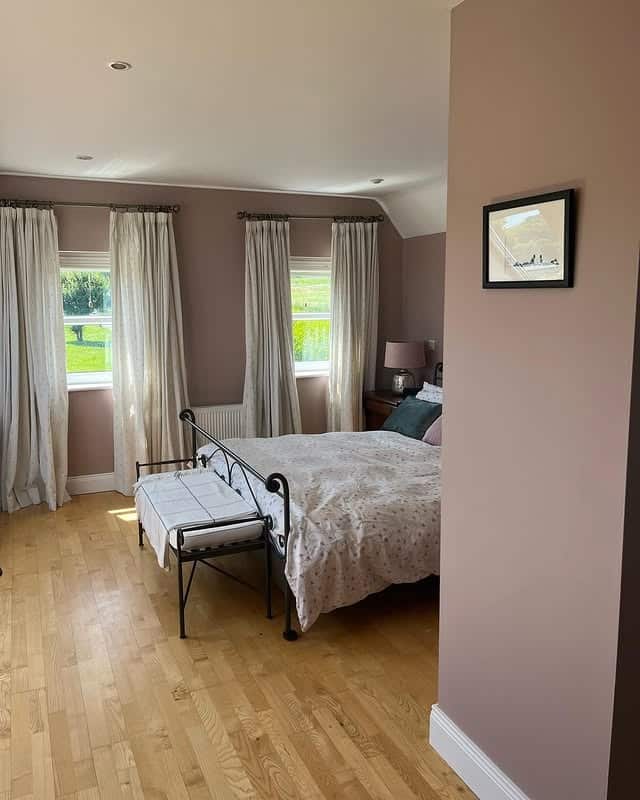 21. Soft Pink Country-Inspired Bedroom - light pink bedroom ideas