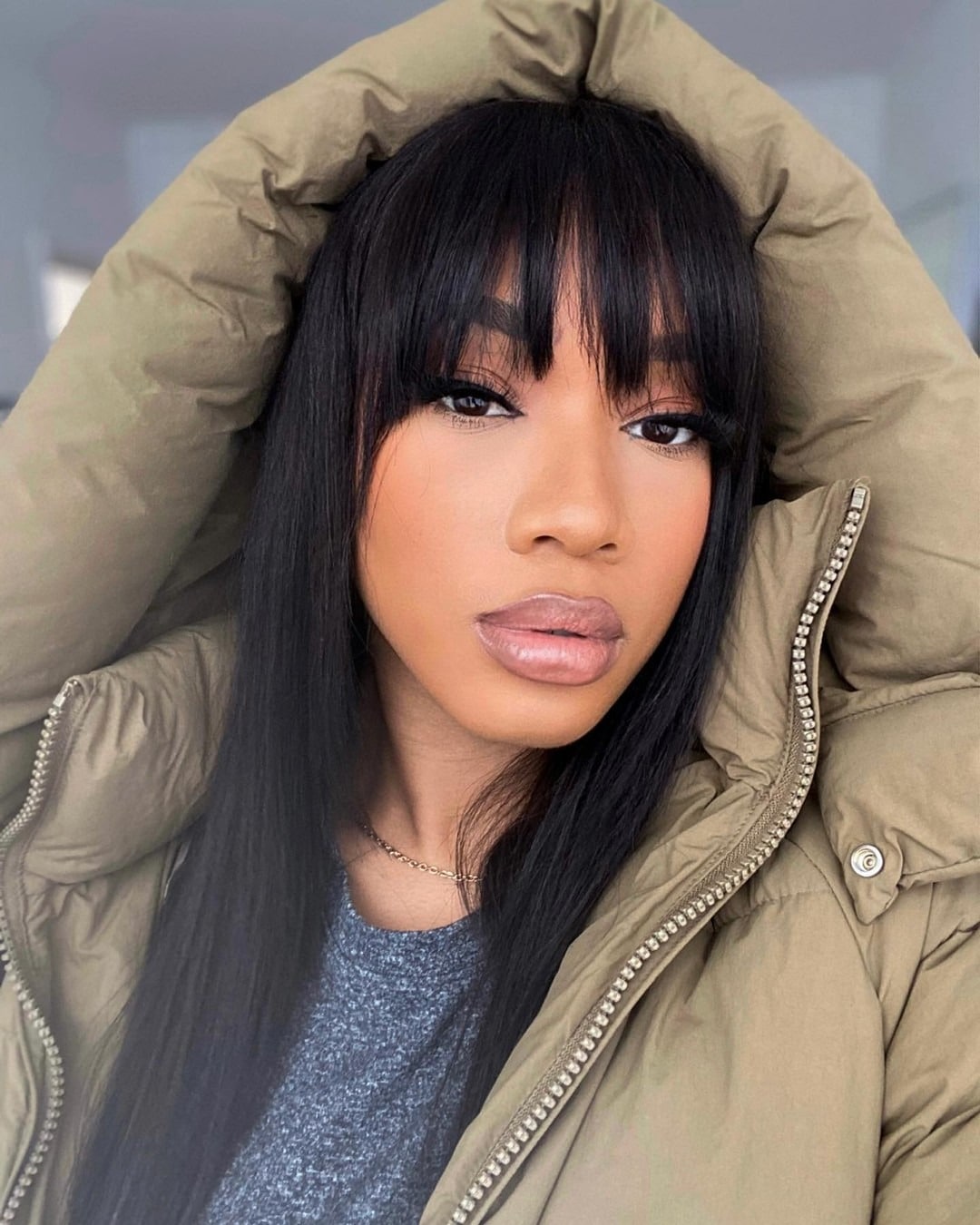 3. Sleek Extra-Long Straight Hair with Jet Black Bangs - Straight Hairstyles with Bangs