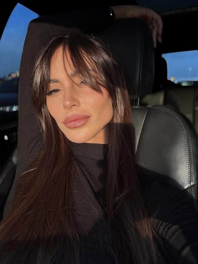 9. Straight Layered Cut with Full Fringe in Soft Blonde - Straight Hairstyles with Bangs