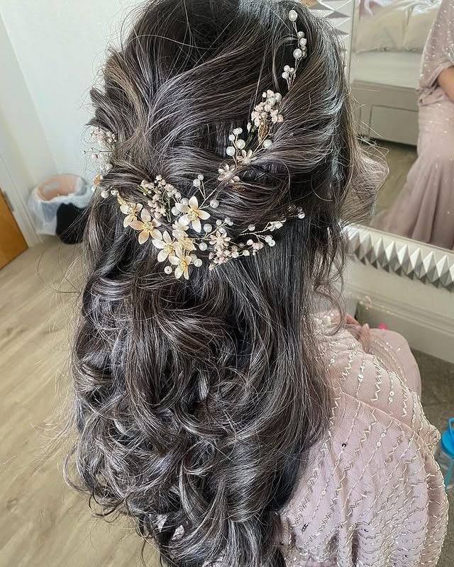 1. Soft Twisted Half-Up with Pearl Floral Accent in Smoky Brunette - Prom Hairstyles