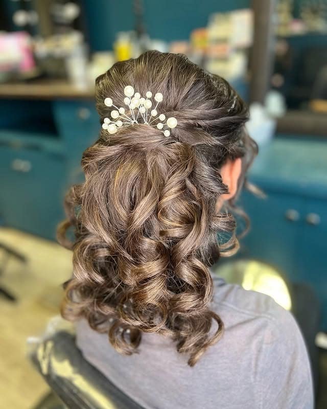7. Curly Half-Up Style with Pearl Cluster Pin in Soft Chocolate Brown - Prom Hairstyles