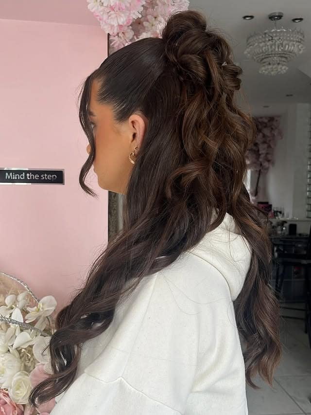 17. High Half-Up Bun with Loose Waves in Dark Chocolate Brown - Prom Hairstyles