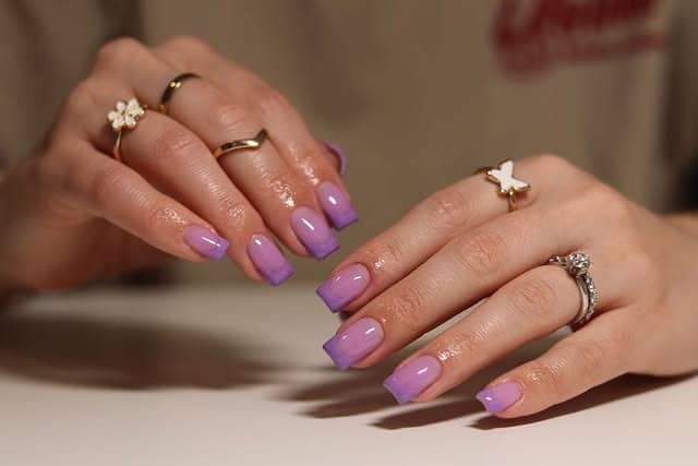 11. Glossy Lavender Square French Tips - purple french tip nail ideas