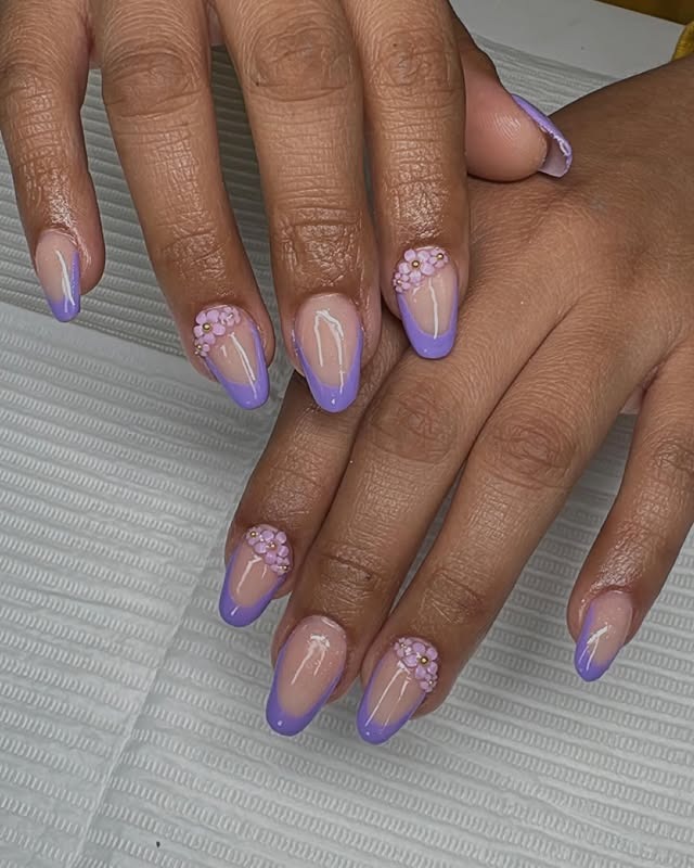 12. Lavender French Tips with Floral Accent Clusters - purple french tip nail ideas