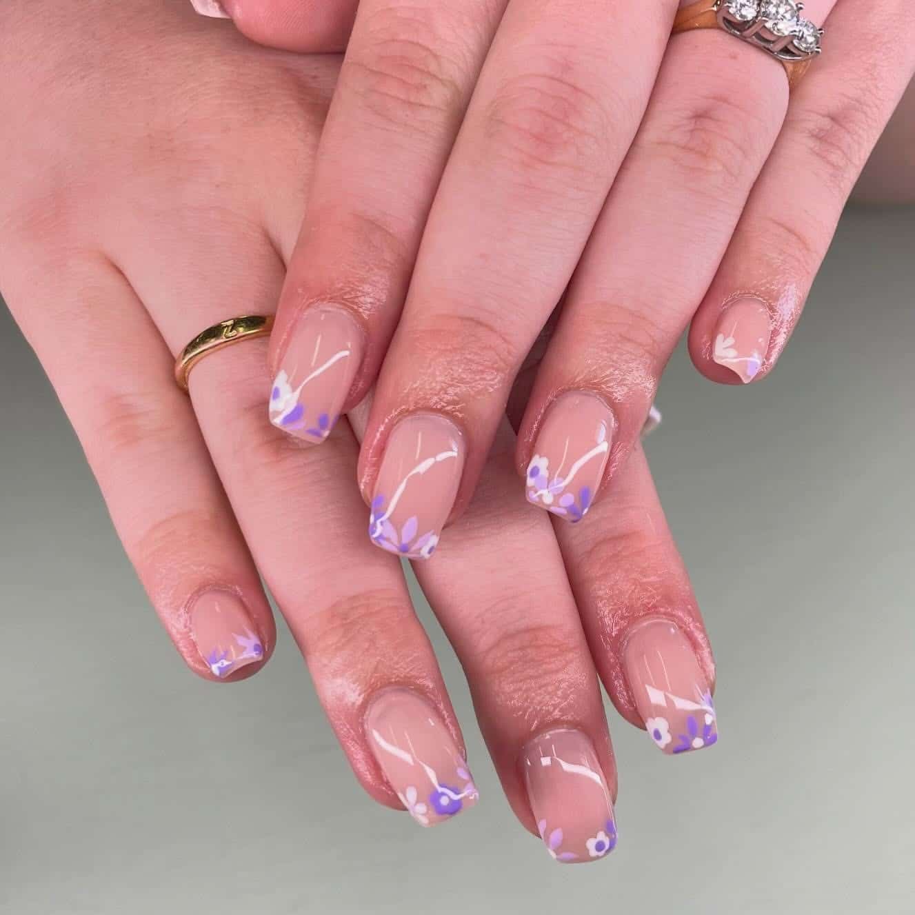 21. Short Square Purple French Tips with Floral Detailing - purple french tip nail ideas