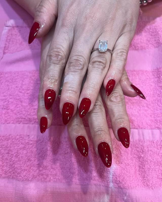 4. Deep Wine Almond Nails - red almond nail ideas