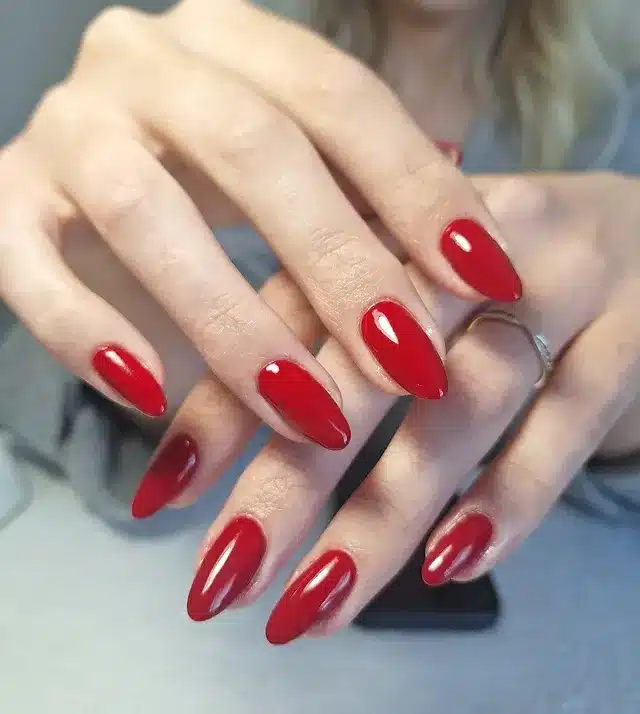 6. Bright Red Almond Modern Classic - red almond nail ideas