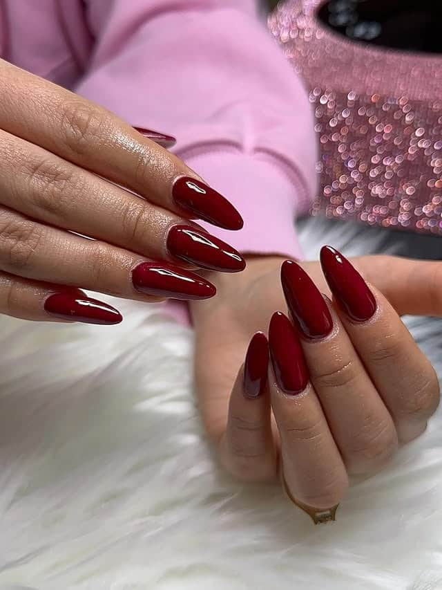 10. Classic Red Almond Salon Staple - red almond nail ideas