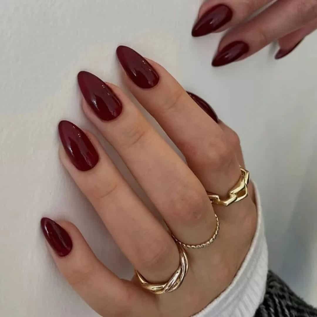 21. Deep Burgundy Almond Gloss - red almond nail ideas