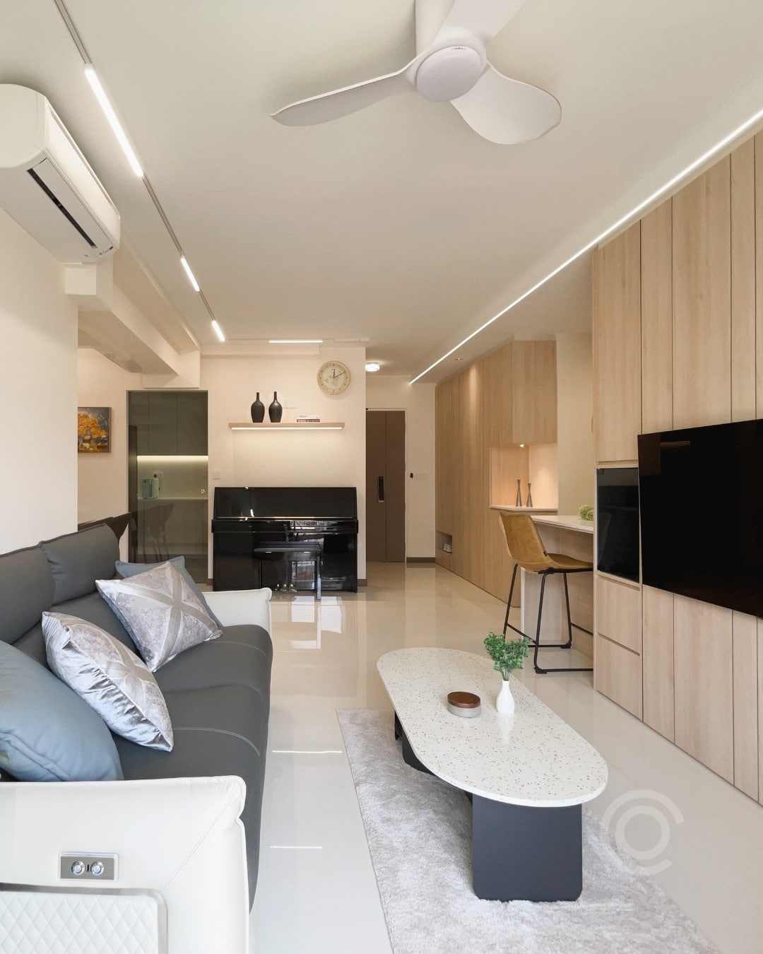 8. Minimalist Living Room with Integrated Kitchen in Light Wood and White - living room and kitchen ideas