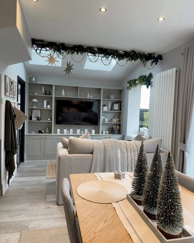 13. Cozy Skylight Living Room in Greige, White, and Natural Wood - living room and kitchen ideas