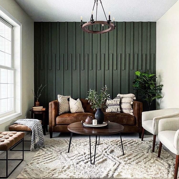 18. Dark Green Slatted Accent Wall with Leather Seating - accent wall ideas for living room