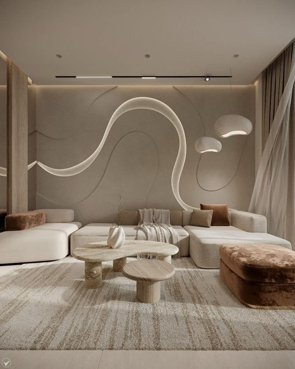 19. Sculpted Neutral Accent Wall with Integrated Lighting - accent wall ideas for living room