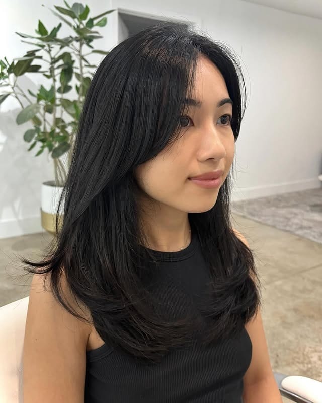 1. Soft Long Layers with Airy Curtain Bangs in Natural Black - Long Layered Hairstyles with Bangs