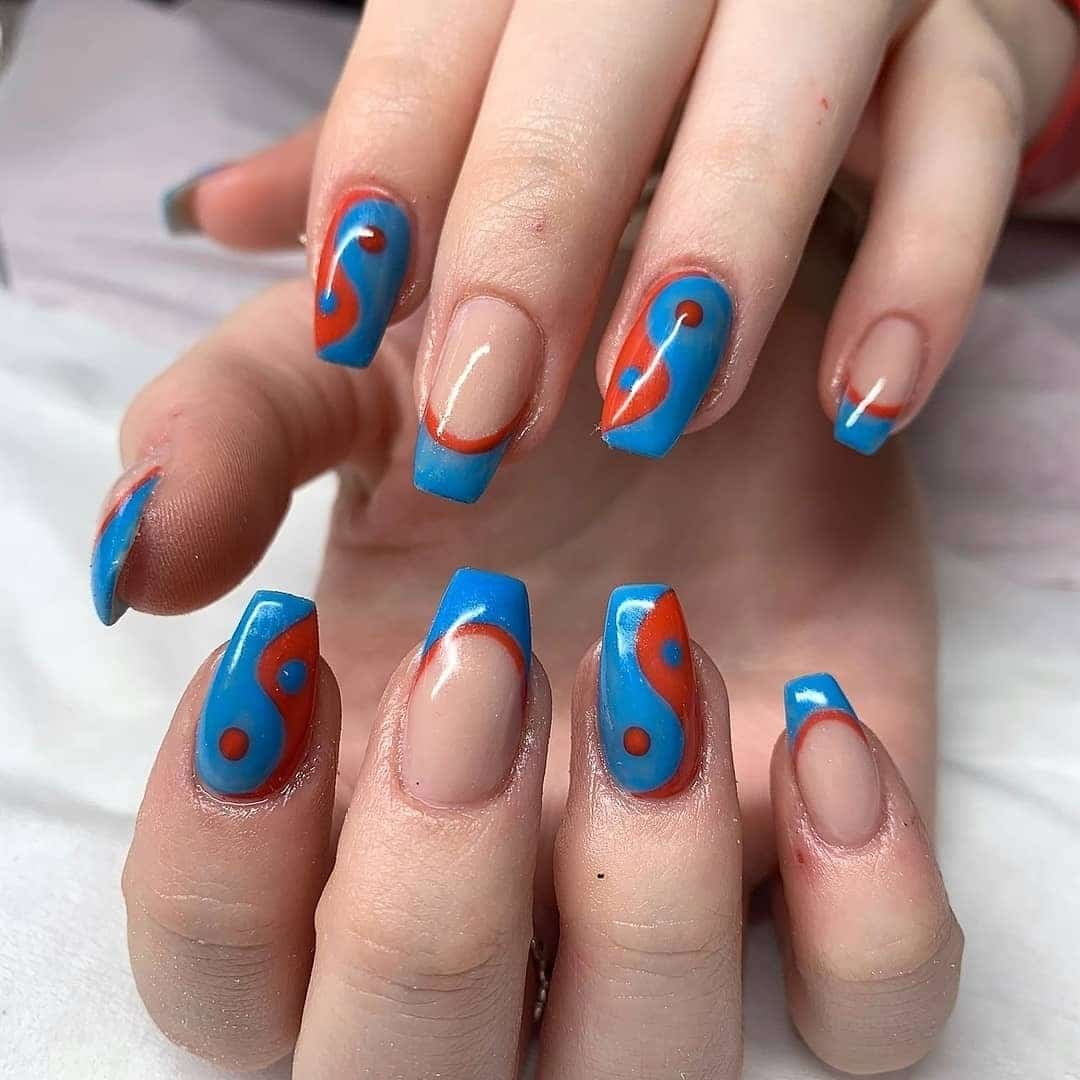1. Retro Swirl French Tips in Red and Blue - red and blue nail ideas