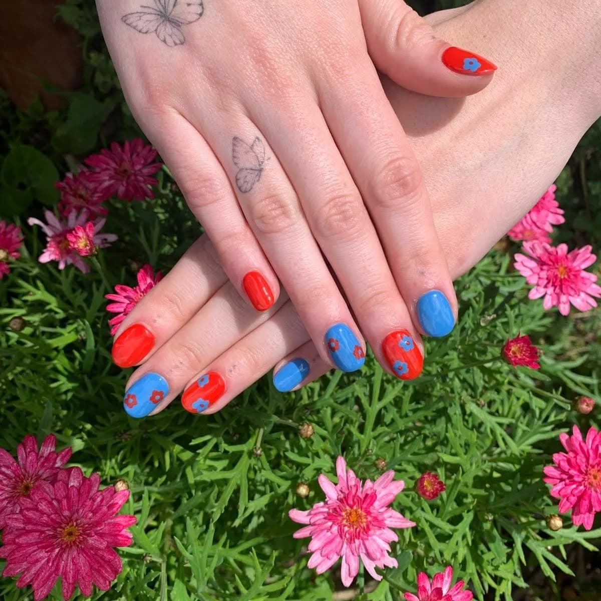 5. Floral Pop Nails in Red and Blue - red and blue nail ideas