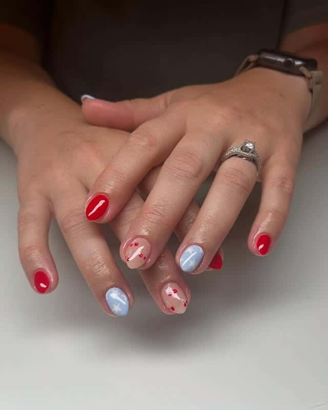 10. Soft Short Nails with Red and Blue Art - red and blue nail ideas
