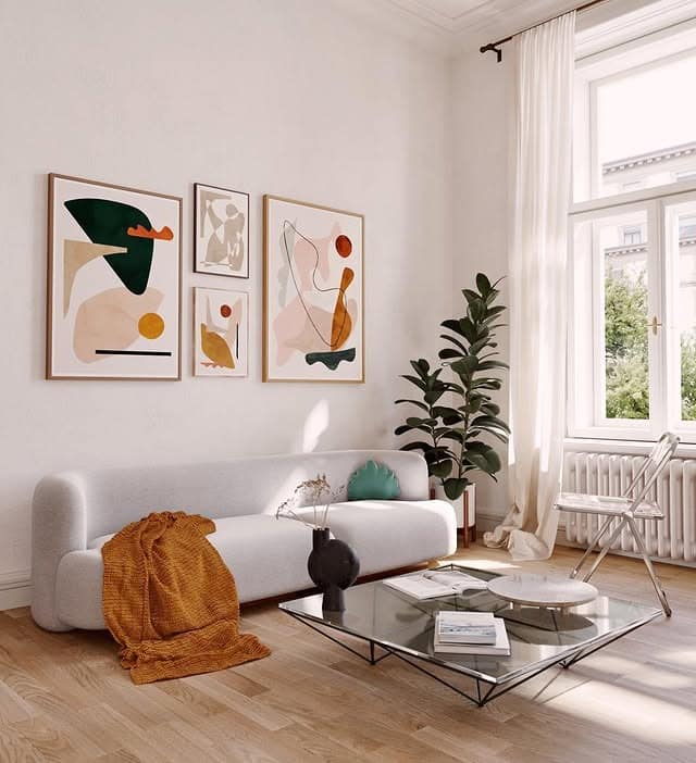 1. Soft Modern Gallery with Warm Neutrals - gallery wall living room ideas