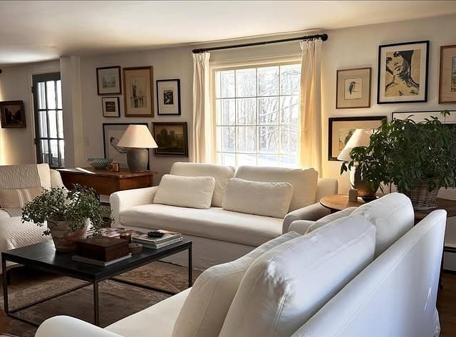 12. Classic Gallery Wall with Warm Neutrals and Cream - gallery wall living room ideas