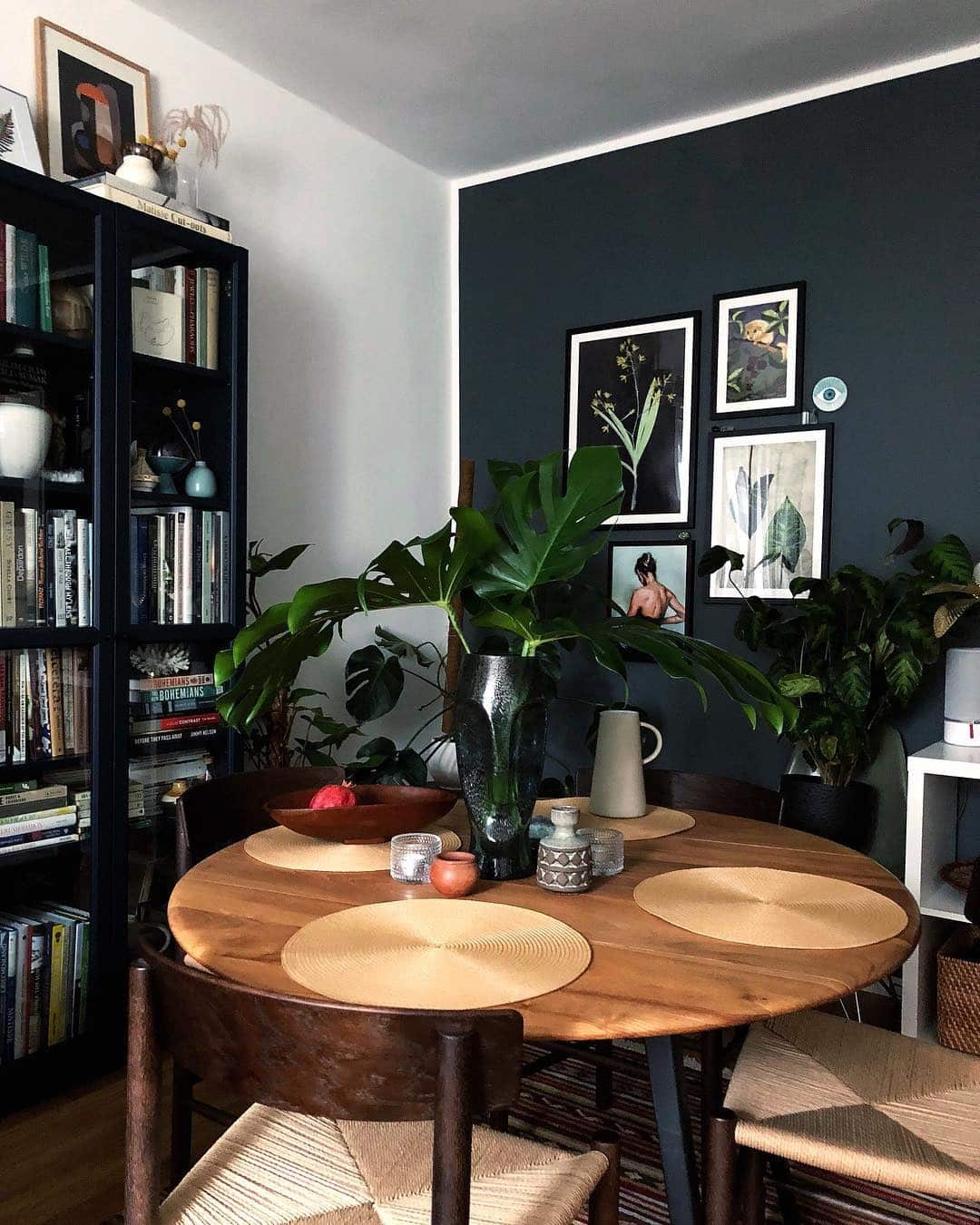 13. Moody Botanical Gallery Wall in Deep Green and Black - gallery wall living room ideas