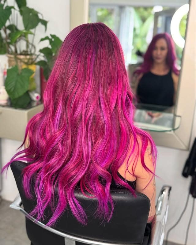 1. Magenta Waves with High-Impact Saturation - Magenta Hair Color