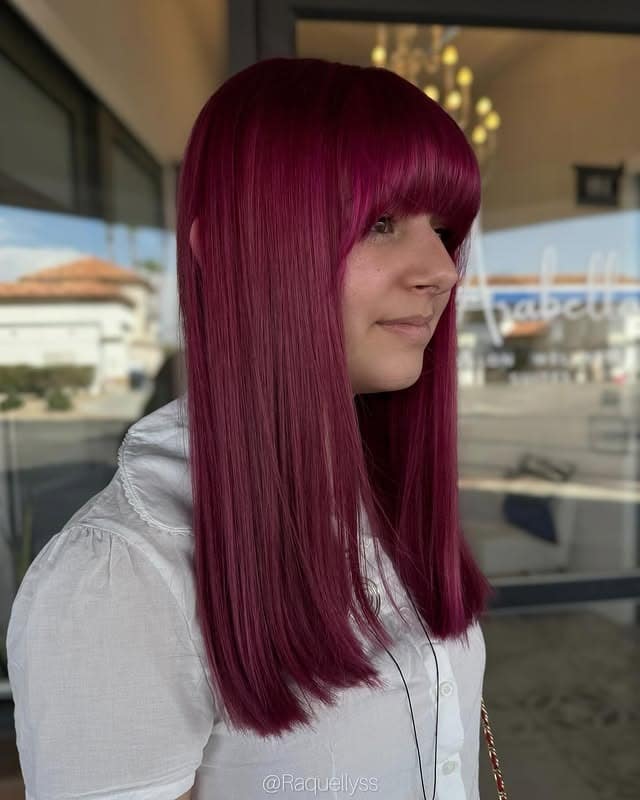9. Sleek Straight Magenta with Full Fringe - Magenta Hair Color
