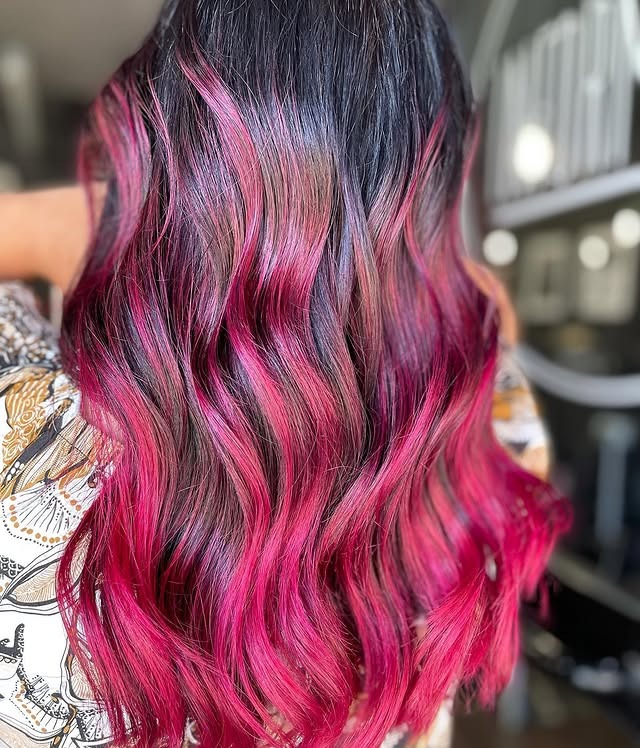 17. Layered Magenta Waves with Bright Accents - Magenta Hair Color