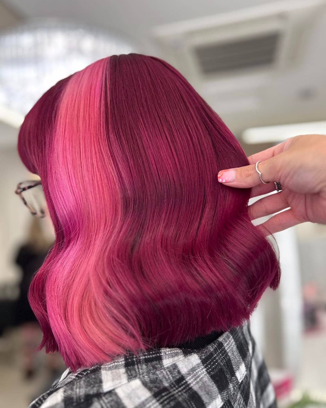 20. Sculpted Magenta Waves with High Shine - Magenta Hair Color