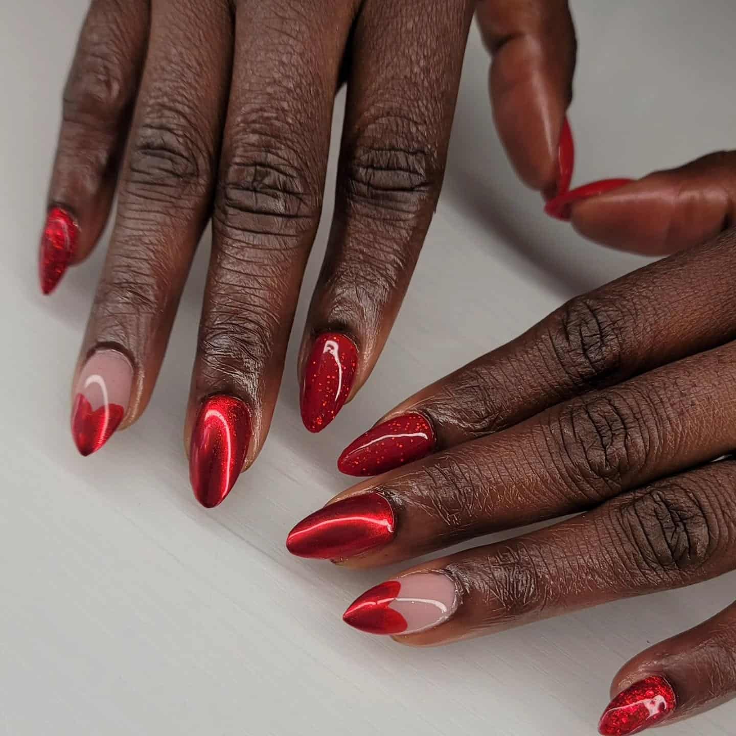 4. Garnet Chrome Mix with Accent Detail - red chrome nail ideas