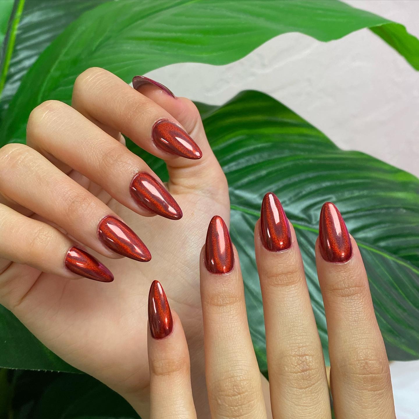 12. Copper Red Chrome Stiletto Nails - red chrome nail ideas