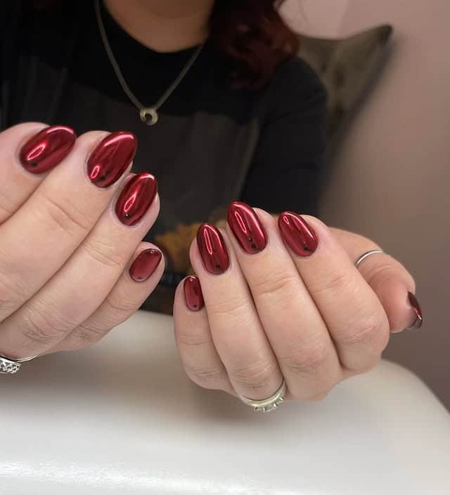 21. Deep Red Chrome Oval Nails - red chrome nail ideas