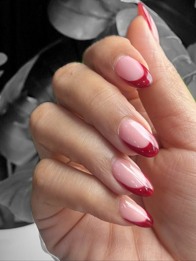 5. Glossy Red Almond French - red french nail ideas
