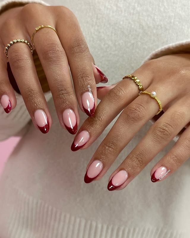 17. Soft Almond Red French With High Shine - red french nail ideas