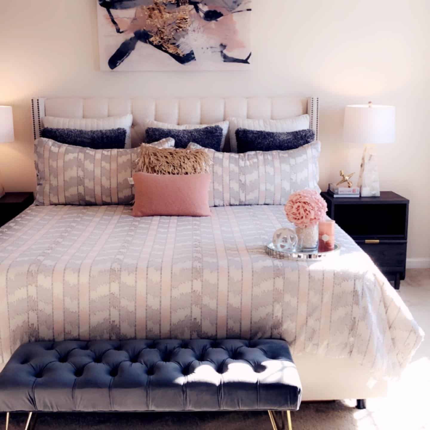 8. Neutral Gray Bedroom with Blush Decorative Styling - pink and gray bedroom ideas