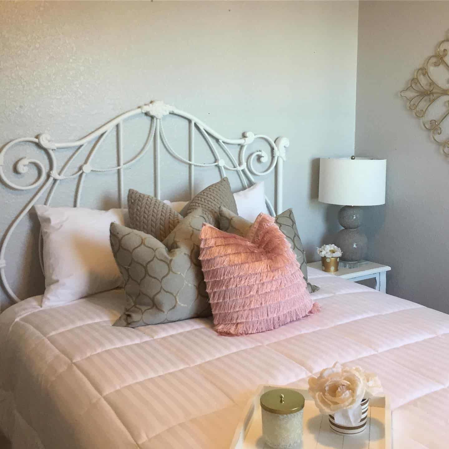 12. Classic Gray and Blush Bedroom with Decorative Pillows - pink and gray bedroom ideas