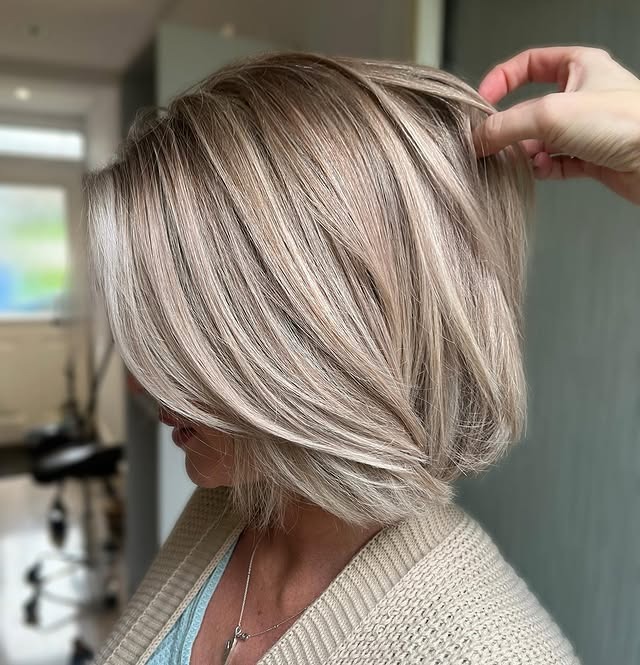 8. Rounded Mocha Feathered Bob - Bouncy Bob Hair