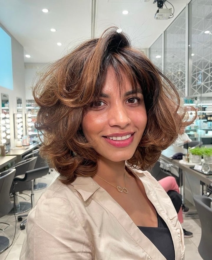 11. Feathered Caramel Volume Bob - Bouncy Bob Hair