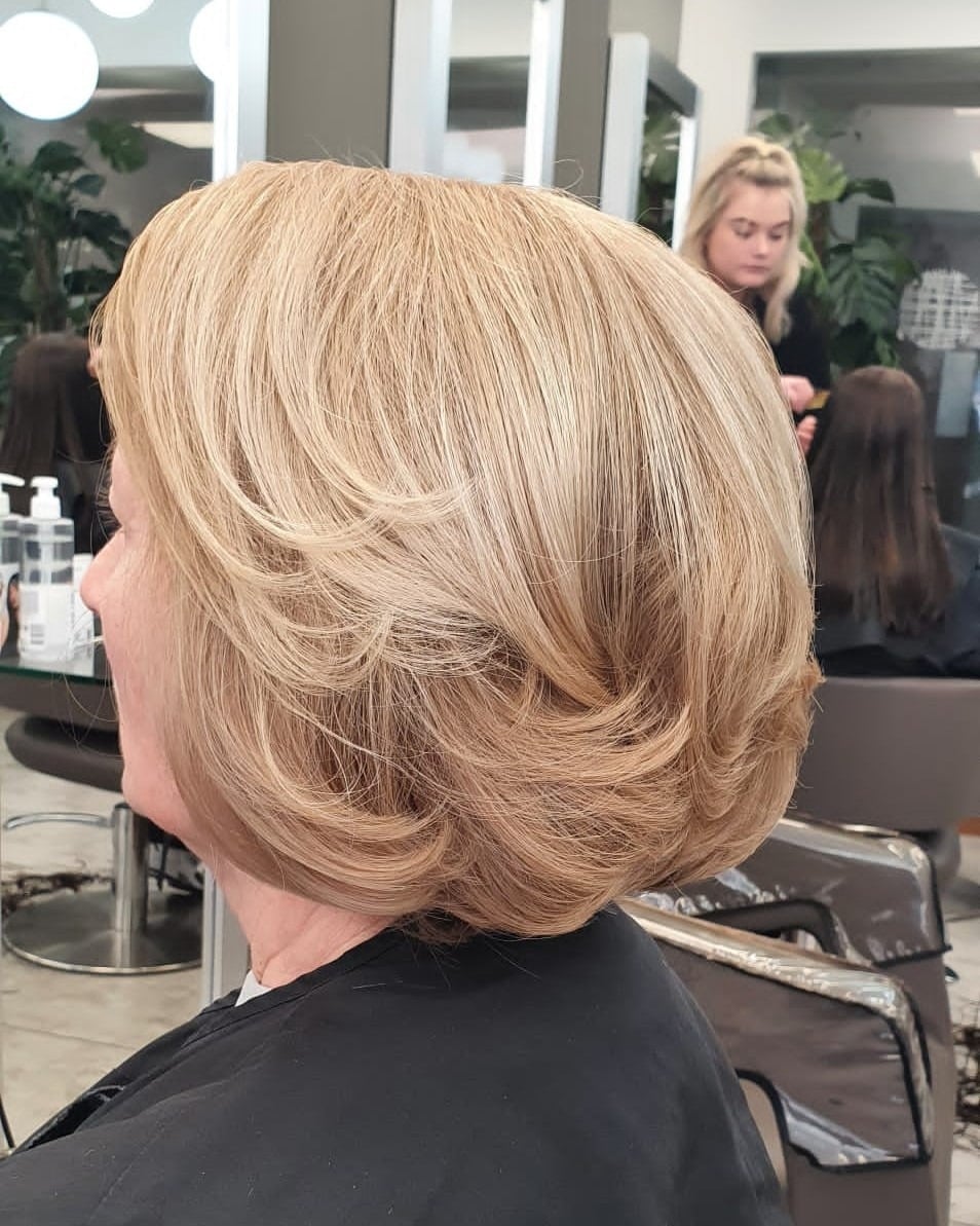 19. Polished Wheat Blonde Precision Bob - Bouncy Bob Hair