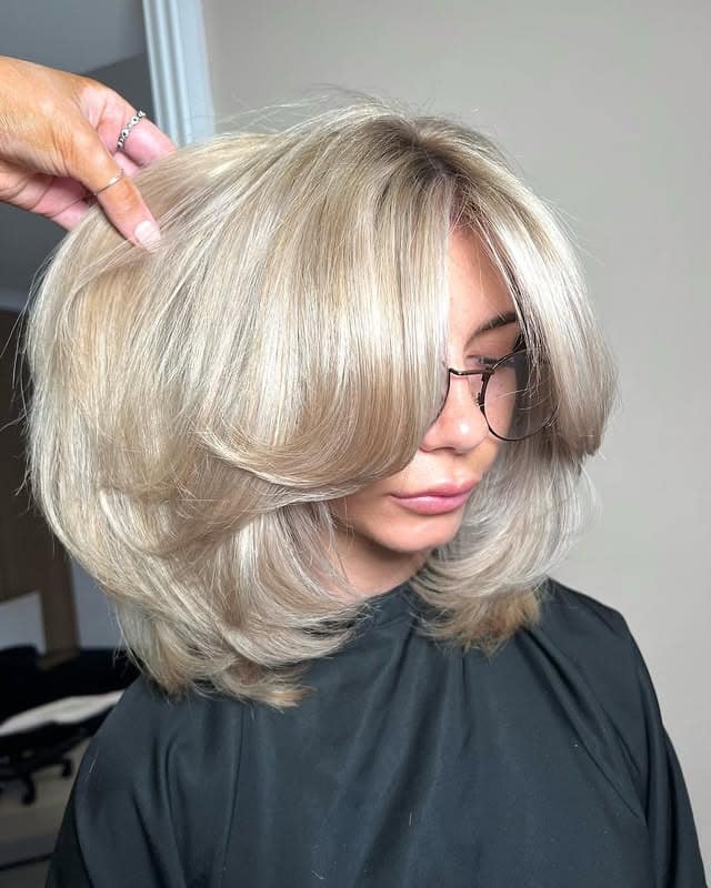 21. Silvery Blonde Layered Bounce Bob - Bouncy Bob Hair