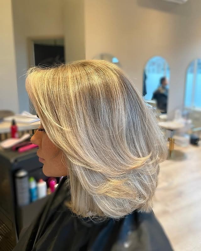 22. Cool Ash Blonde Sculpted Bob - Bouncy Bob Hair