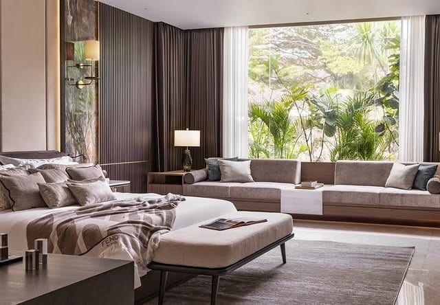 11. Indoor-Outdoor Dark Wood Bedroom in Soft Neutrals - dark wood bedroom ideas