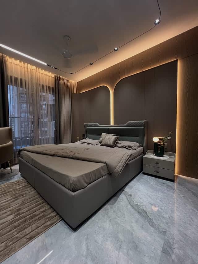 20. Sculpted Dark Wood Bedroom with Architectural Lighting - dark wood bedroom ideas