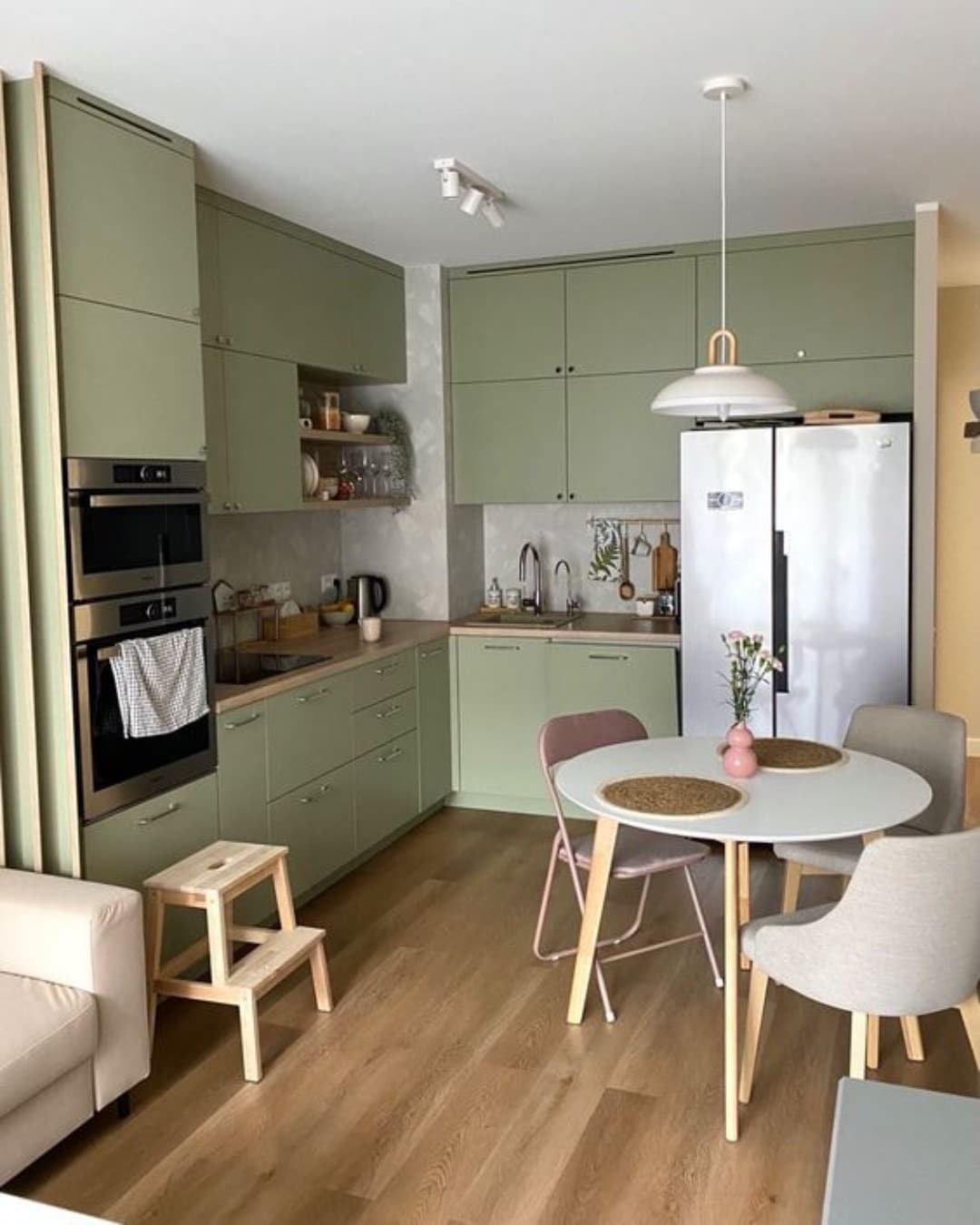 5. Soft Olive Cabinets for a Calm Modern Kitchen - kitchen cabinet color ideas