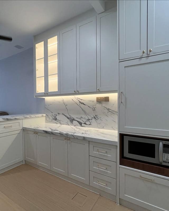 8. Soft Gray Cabinets with Full-Height Storage - kitchen cabinet color ideas