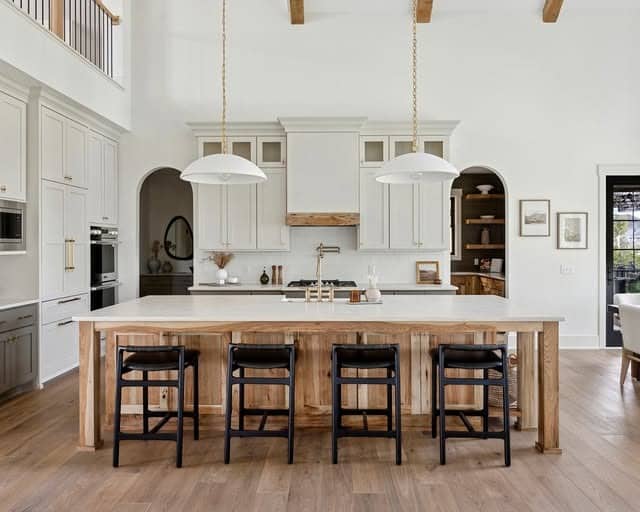 15. Creamy White Cabinets with Rustic Wood Island - kitchen cabinet color ideas