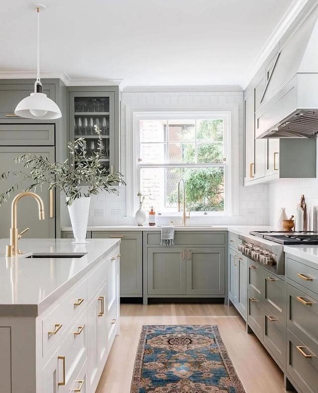 17. Muted Green Cabinets with White Balance - kitchen cabinet color ideas
