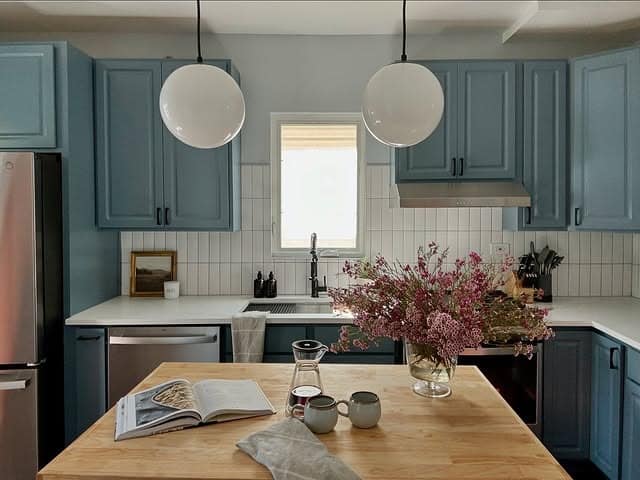 19. Blue-Gray Cabinets with Clean Transitional Style - kitchen cabinet color ideas